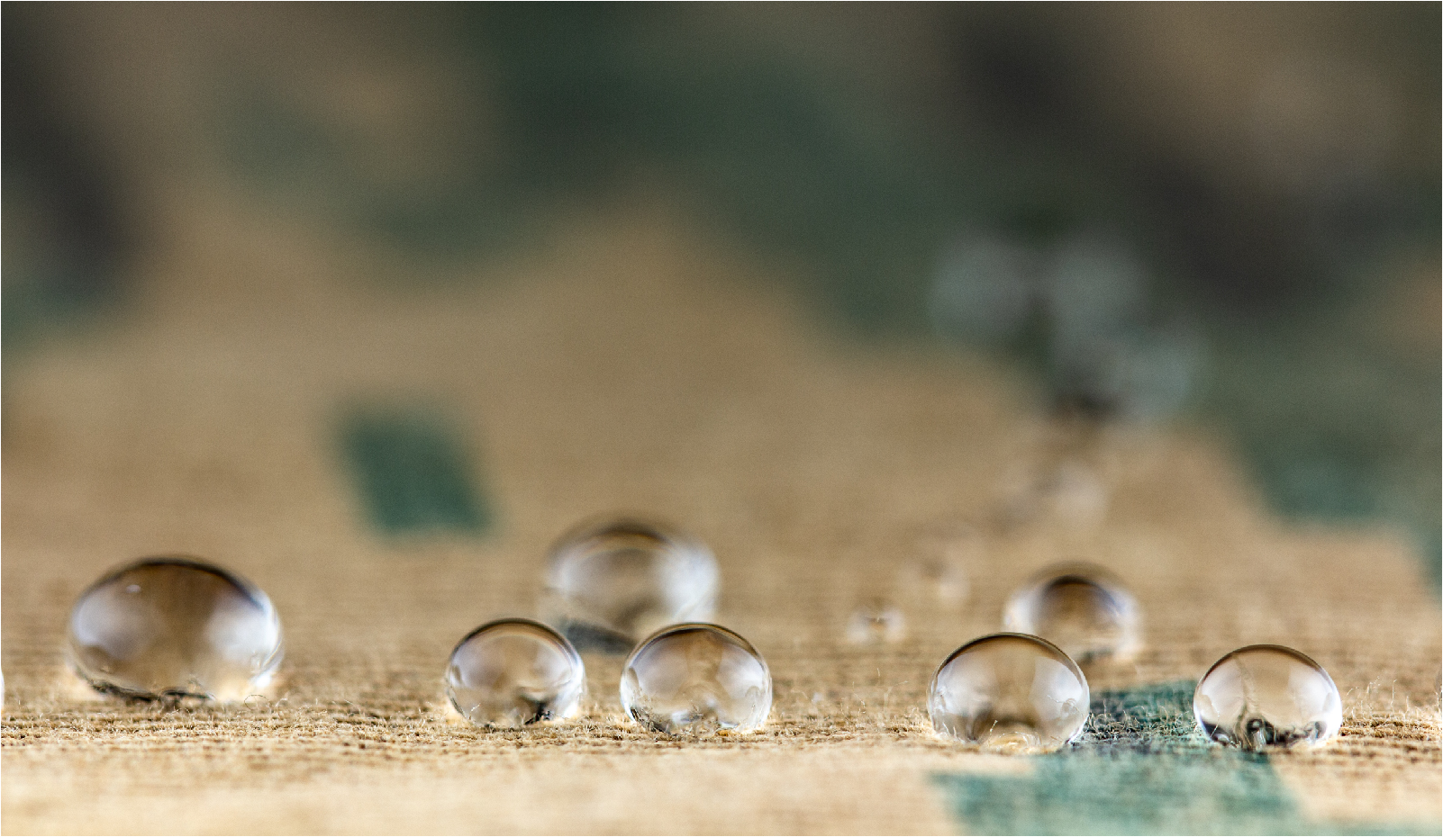 Water droplets beading on a coated fabric