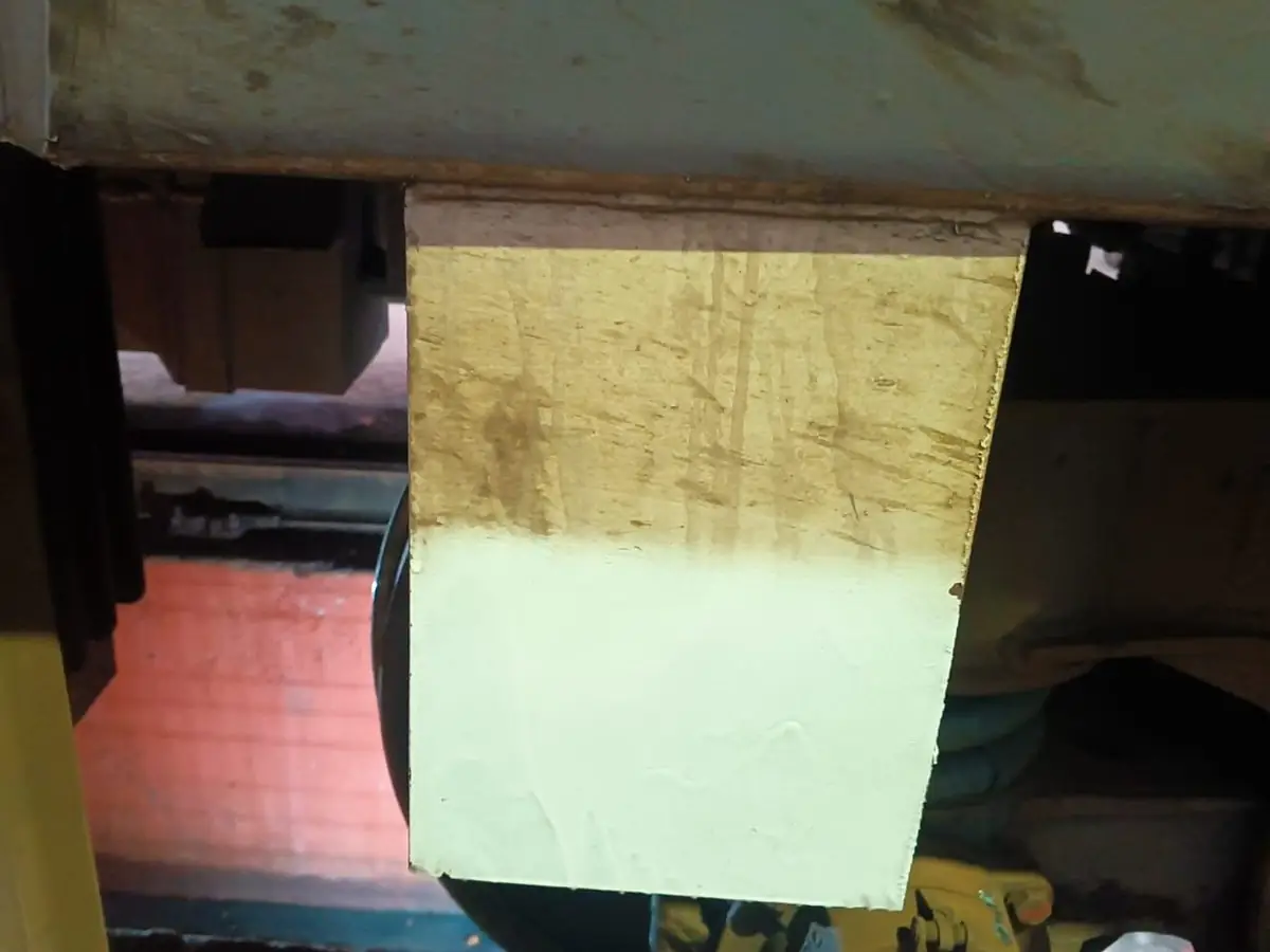 Indian Railways coach underframe panel, top half dirty, bottom half cleaned with Nanoman Biocleaner